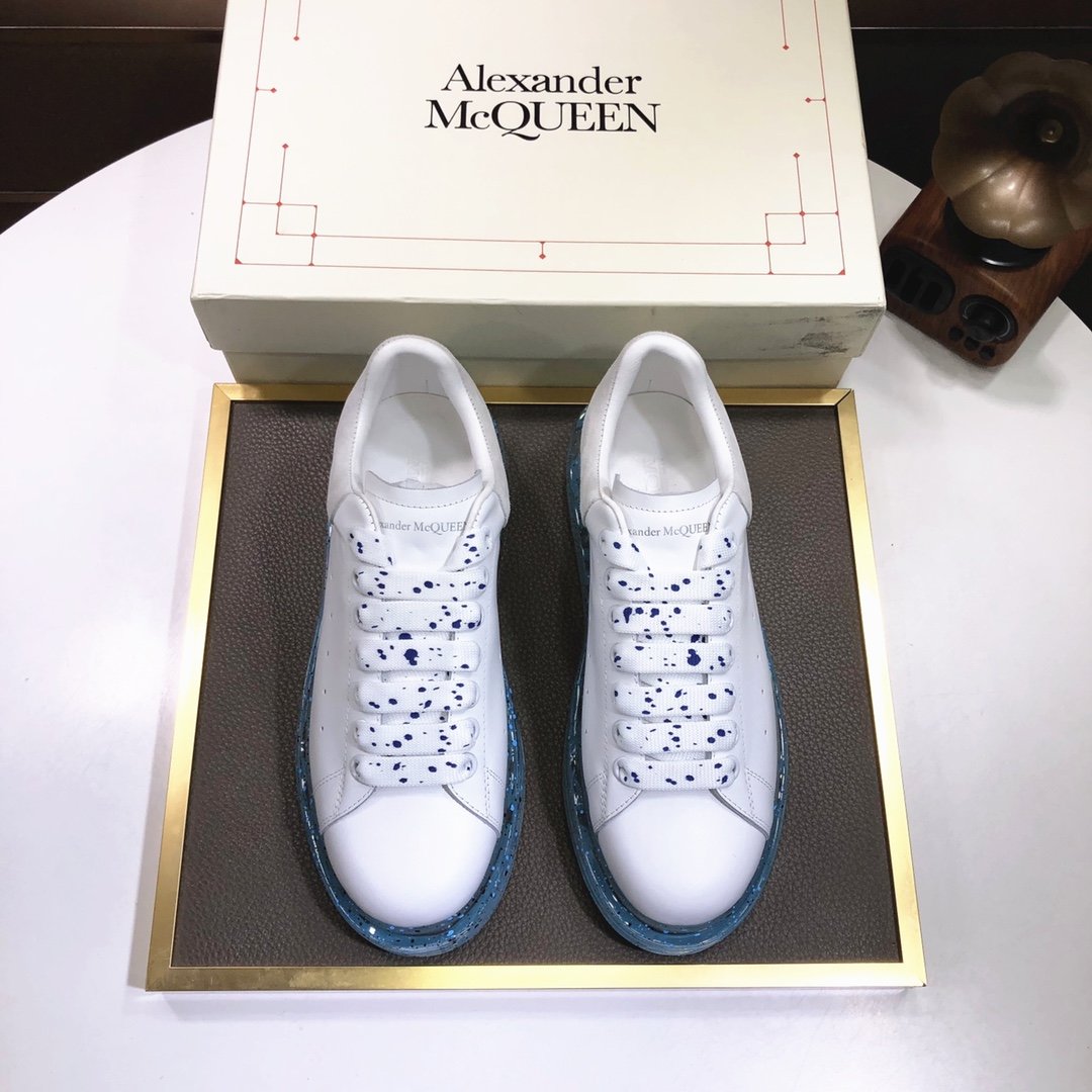 ALEXANDER MCQUEEN BIANCHE CON SUOLA IN GOMMA AZZURRA